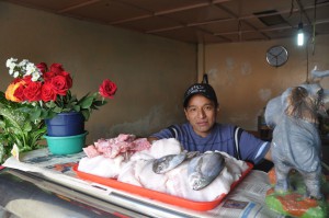 Man selling fresh fish