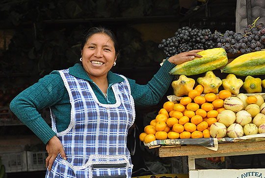 Woman selling fruits in Quito